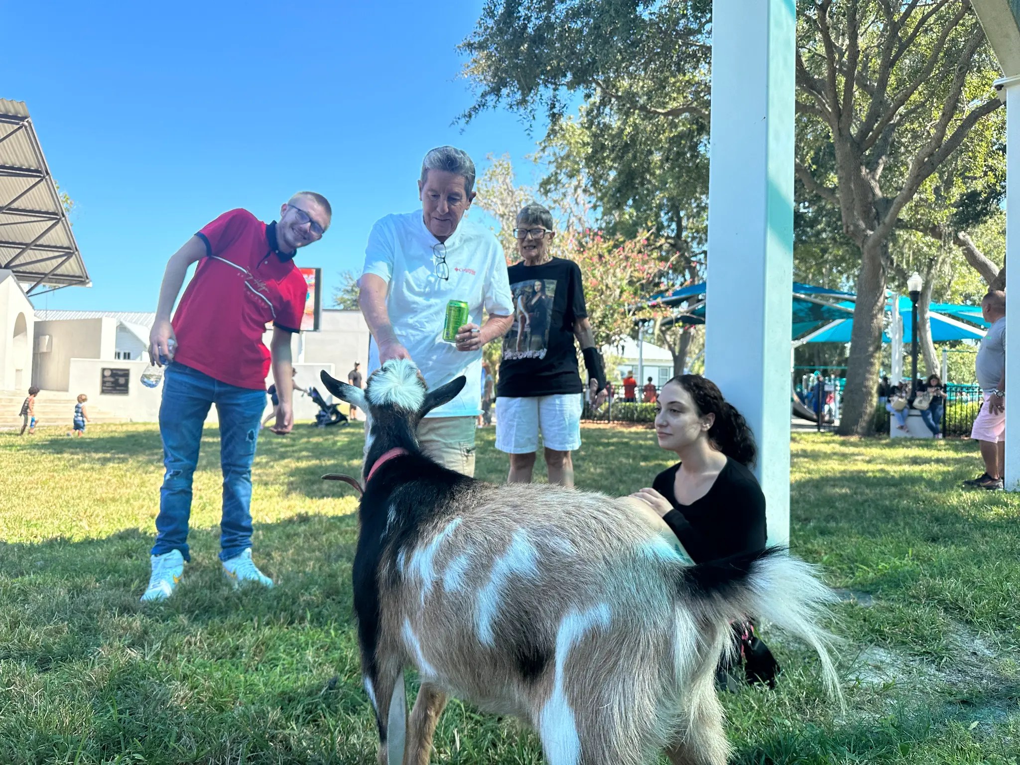 Community walk with goat supporting addiction recovery awareness in New Port Richey FL